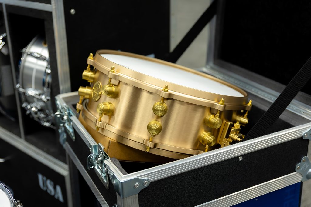 DrumFest at PASIC featuring a closeup of a gold snare drum