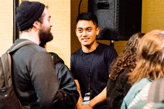 Percussive Arts Society member talks with other members at the Percussive Arts Society International Convention.