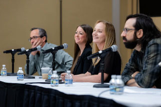 PAS Committee members speak on a panel at PASIC. 